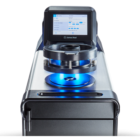 James Heal - AirPro air permeability tester - close up of uplit testing head and touchscreen