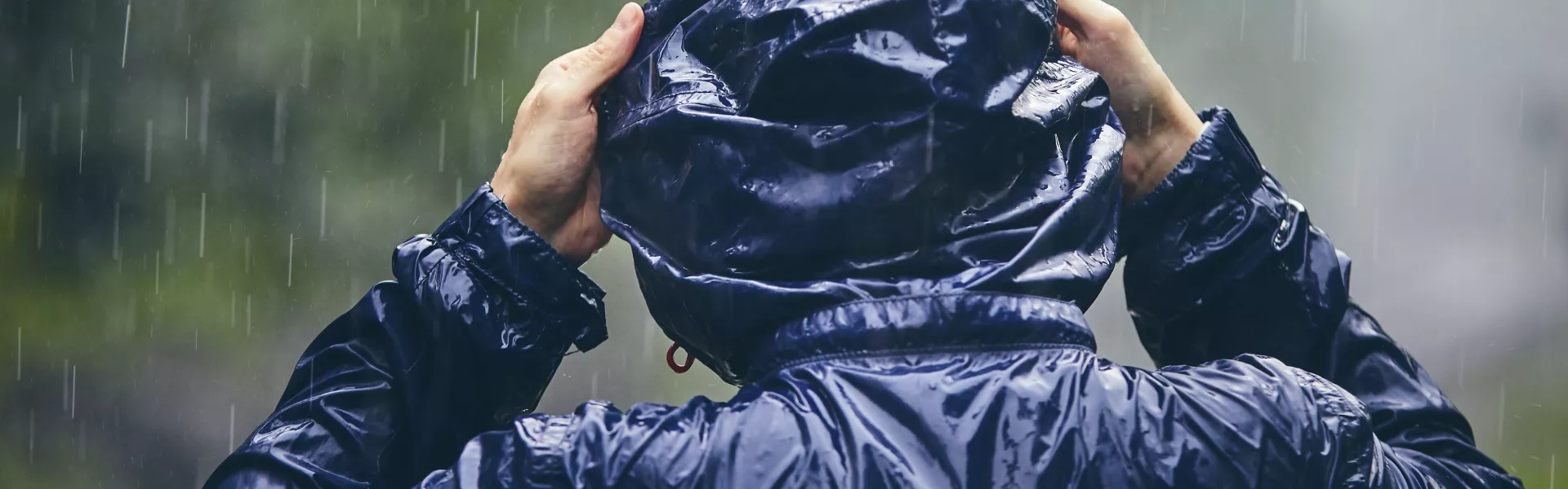 Person in water repellent coat