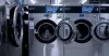 Laundromat washing machines in a row - laundry